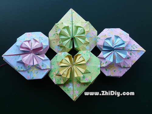 精致的折纸心形制作方式可以搭配情人节礼物