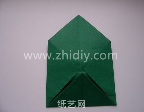 看这个折叠的，像是一个折纸的钱包或者是折纸的粽子