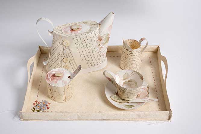 变废为宝制作出来的精美纸雕茶壶绝对算的上是上乘的纸艺作品