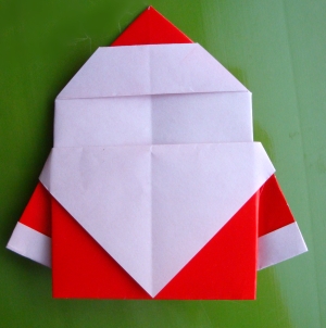 现在已经将手工折纸圣诞老人的手工折纸部分制作完成了