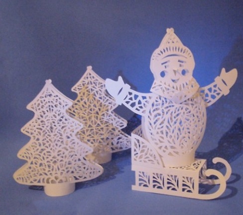 通过类似于剪纸的方式制作出来的纸艺小雪人结构具有很浓郁的节日气氛