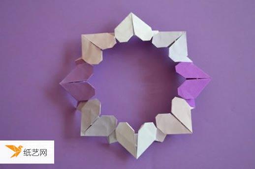 使用折纸折叠出来爱心花环的主要步骤图解