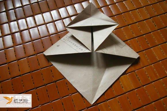 使用一些简单折纸折叠庞大的马伯纳犀牛的图解