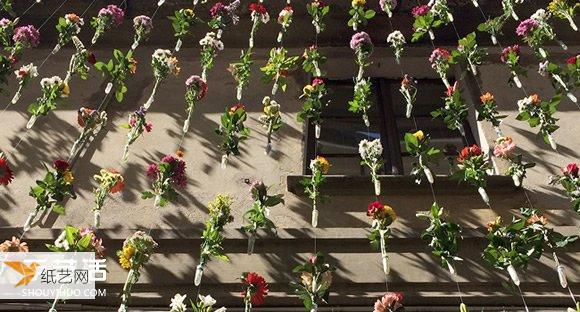 米兰设计师用2000朵鲜花编织成帘幕修饰外墙