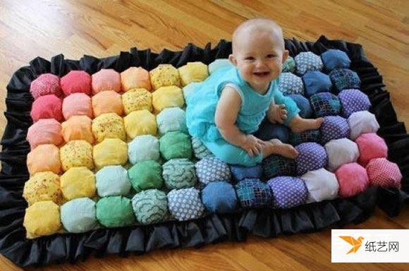 一张手工制作的非常好看个性的宝宝地毯布艺教程