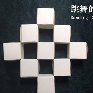 使用折纸折叠会跳舞的方块玩具的方法图解教程