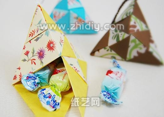 纸艺菱角吊饰的手工折纸图解教程还可以用来制作糖果收纳盒
