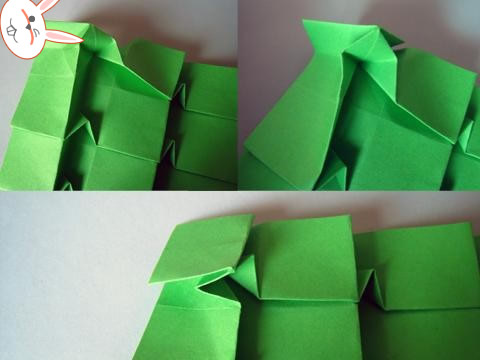 第八步就是进行细节的不同四方形结构的制作，从而使得手工折纸圣诞树不同角度形成的立体结构变得非常的漂亮和具有动感