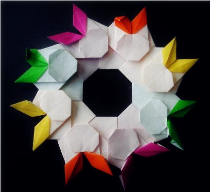 组合折纸制作的折纸小兔子花盘具有极好的装饰效果
