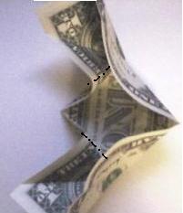 通过简单的折叠可以让一个独特有趣的金钱龟形象呈现在手工制作者的面前