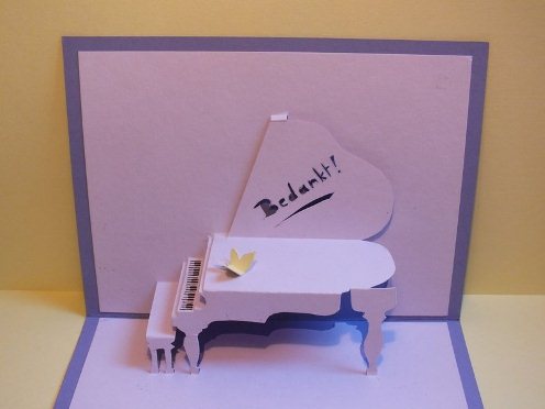 七夕情人节立体钢琴贺卡的手工制作图解教程