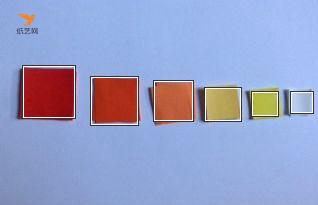 循序渐进的剪裁不同大小不同颜色的正方形的纸张