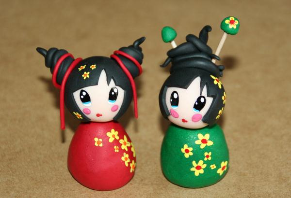 用超轻粘土制作的一对中国娃娃新年礼物
