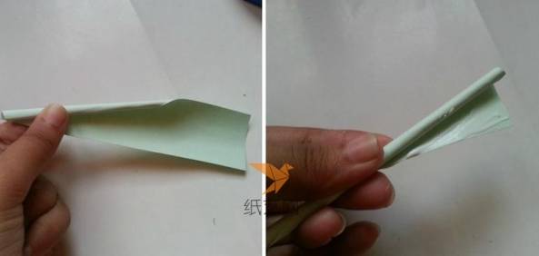 将淡绿色的纸卷成花茎