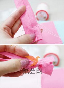 用粉色的布剪成长条，像糖纸一样卷起来，扎好一边