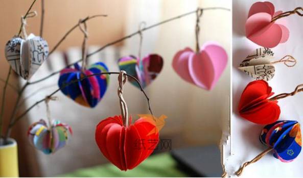 把心形用纸绳挂起来就可以成为一棵漂亮的心形装饰树啦。