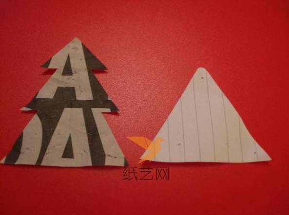我们先用纸张剪出一个圣诞树和一个底边一样长的等边三角形