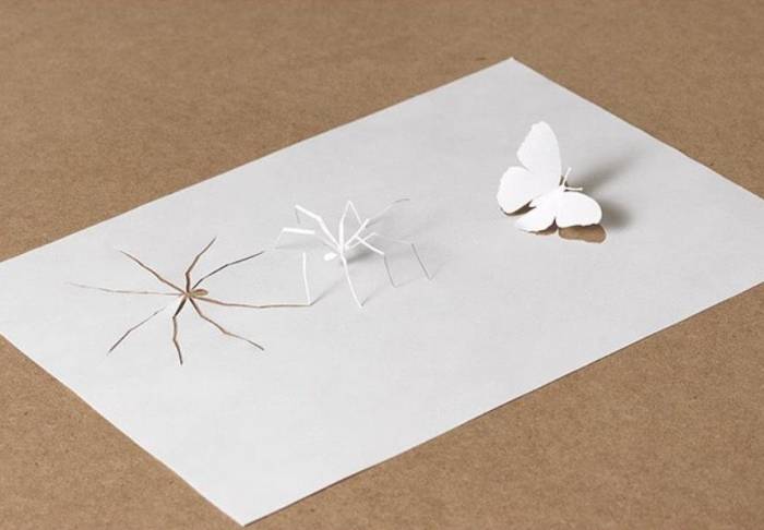 简单漂亮的捕猎者纸雕新年装饰制作教程