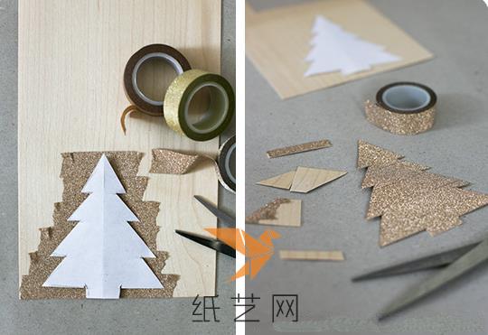 先用白纸剪出圣诞树的样子，然后剪出纸板的圣诞树