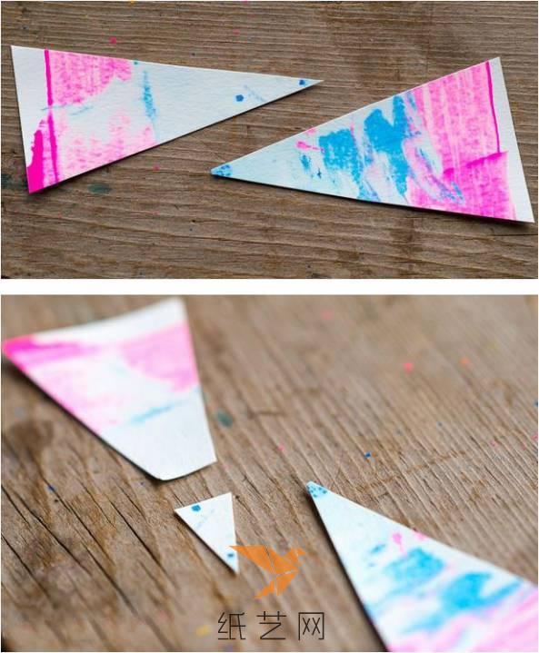 将纸张剪出两个三角形，将其中一个的角剪掉