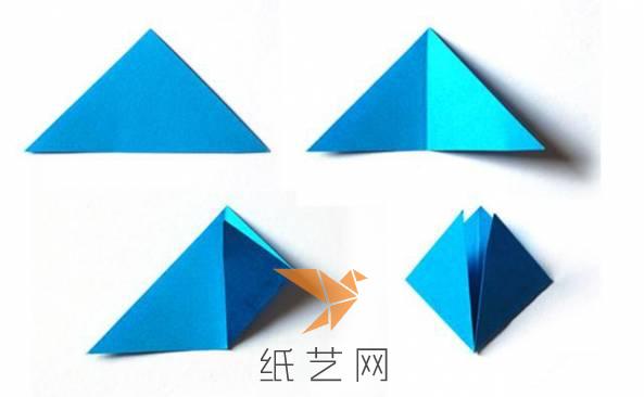 把纸张来剪裁成三角形，然后进行折叠