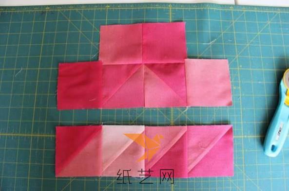 用这种方法来制作很多块两色的正方形布块，然后缝起来