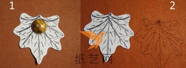 先在白纸上面画出枫叶和叶脉来，然后临摹到不织布上面