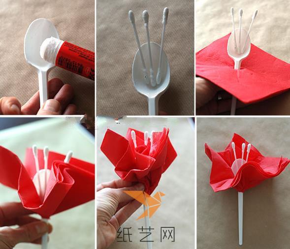 将塑料勺子插进折好的红色彩纸中间的位置，然后粘好棉签作为花蕊
