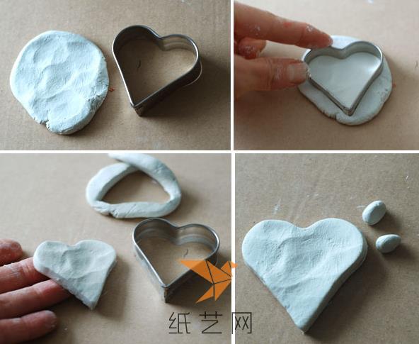 先来将白色的粘土按扁成为一个圆形，然后用心形的模具按出一个心形来