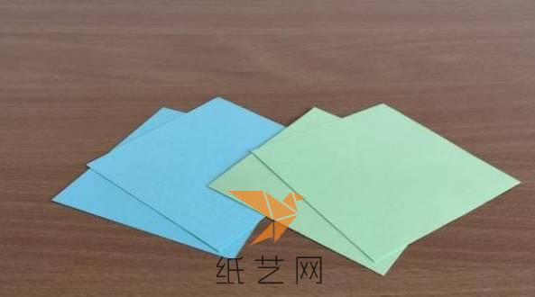 为了折纸飞镖能更漂亮，可以准备两种颜色的正方形纸各两张