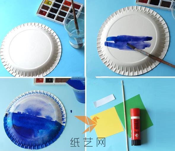 首先我们把一个纸盘子下半部分涂上蓝色，因为海水就是蓝色的