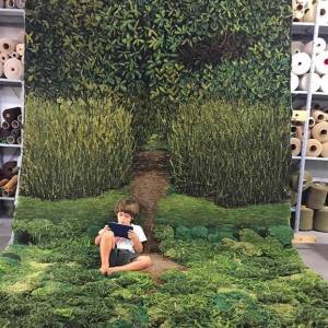 绿色毛线编织的自然系地毯